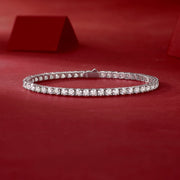 Moissanite tennis bracelet on a red background